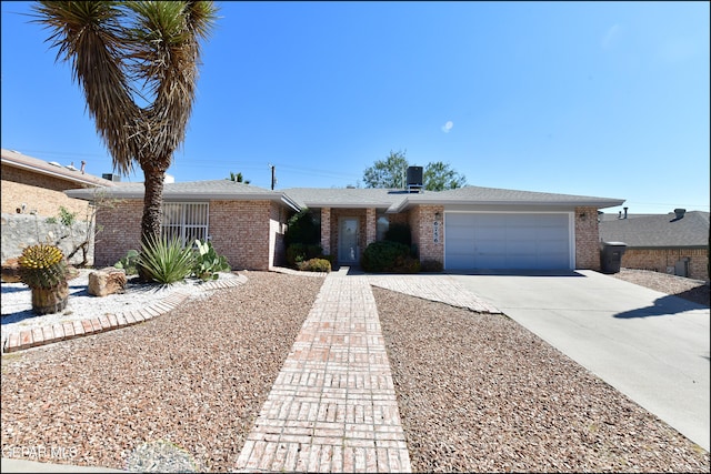 single story home with a garage