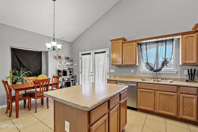 kitchen with decorative light fixtures, a notable chandelier, stainless steel dishwasher, high vaulted ceiling, and a center island