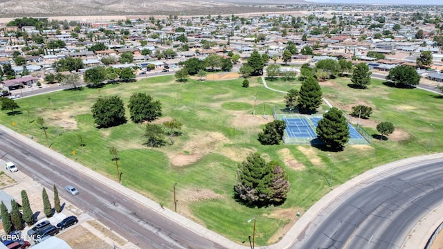 drone / aerial view featuring a mountain view and a residential view