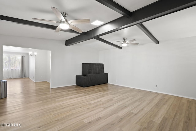 unfurnished room featuring light wood-style floors, baseboards, ceiling fan with notable chandelier, and vaulted ceiling with beams