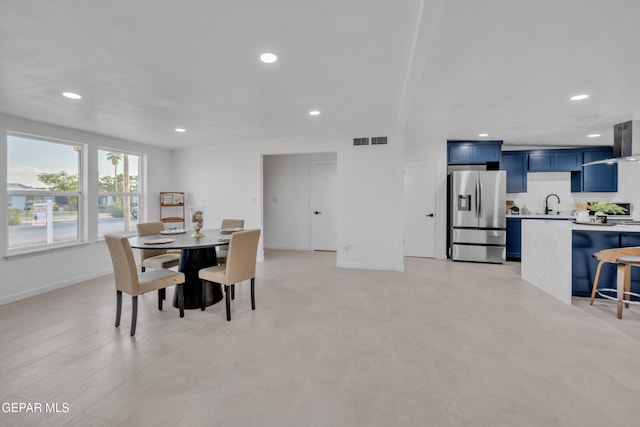 dining room featuring sink