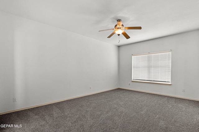 carpeted empty room with ceiling fan