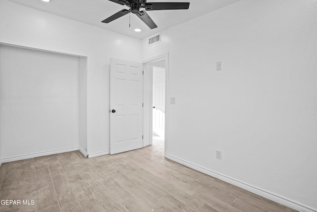 unfurnished bedroom featuring light hardwood / wood-style floors and ceiling fan