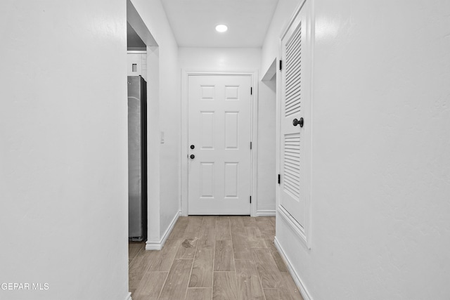 hallway featuring light hardwood / wood-style floors