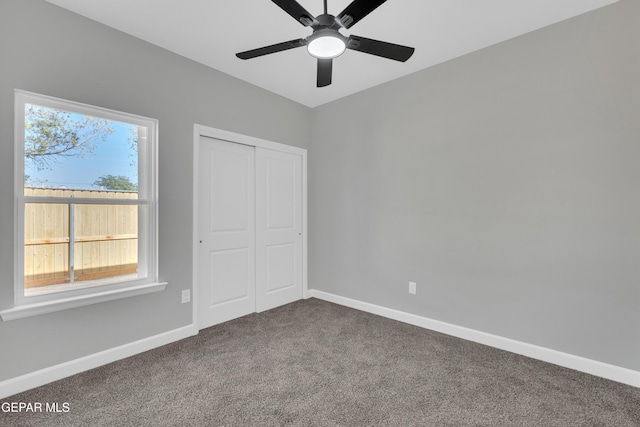 528 Telop Rd, Socorro, TX 79927 - unfurnished bedroom featuring a closet, baseboards, a ceiling fan, and carpet floors