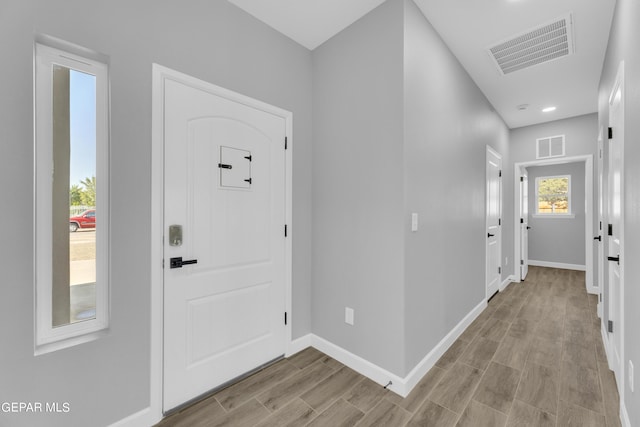 528 Telop Rd, Socorro, TX 79927 - entrance foyer featuring wood finish floors, baseboards, and visible vents
