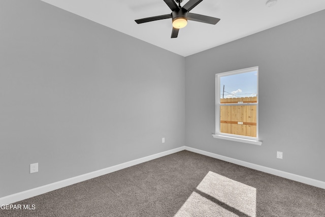 empty room featuring ceiling fan and carpet floors