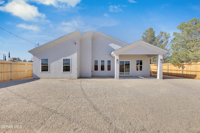 rear view of house with a patio area