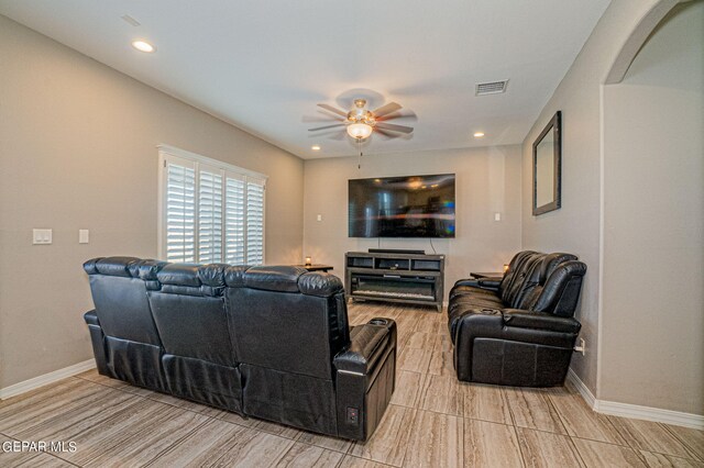 living room with ceiling fan