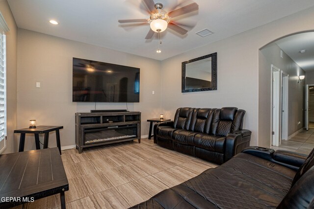 living room featuring ceiling fan