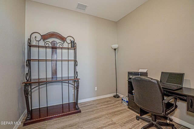 office space featuring light wood-type flooring