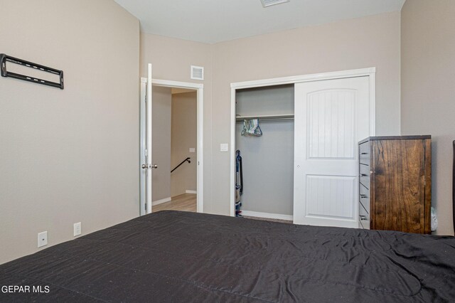 unfurnished bedroom with a closet