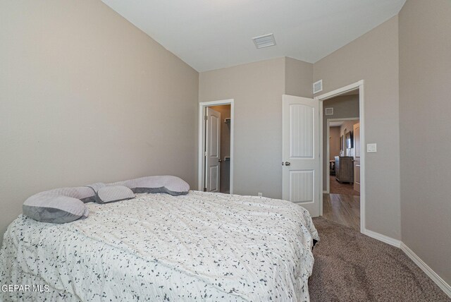 bedroom featuring carpet