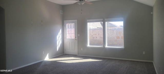 carpeted empty room featuring high vaulted ceiling and ceiling fan