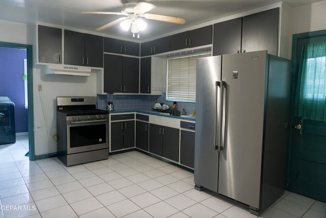 kitchen featuring ornamental molding, tasteful backsplash, light tile patterned floors, appliances with stainless steel finishes, and ceiling fan