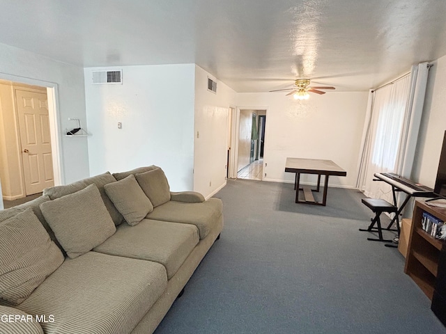 living room with carpet floors and ceiling fan