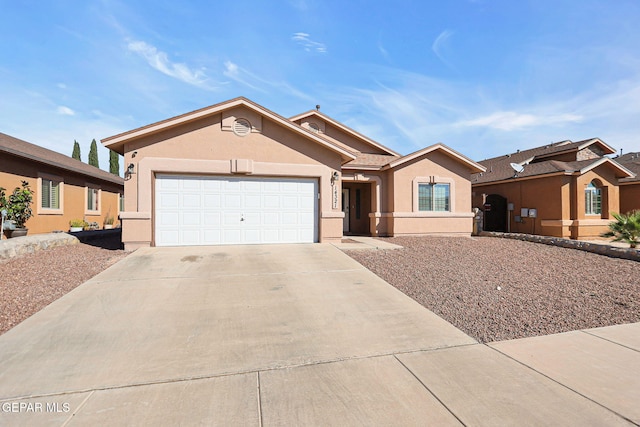 ranch-style home with a garage