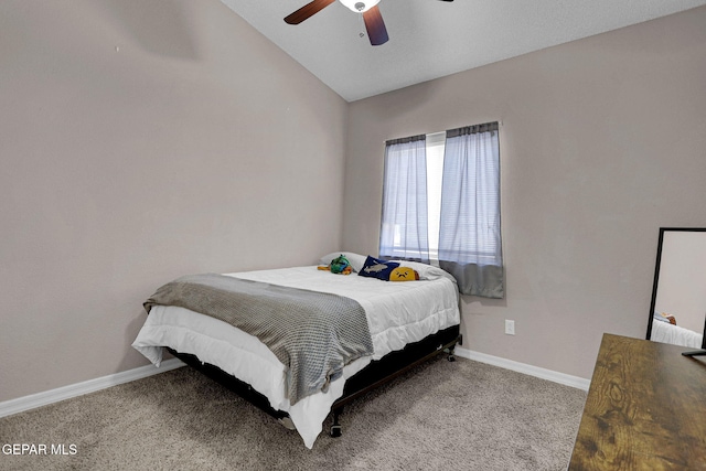 carpeted bedroom featuring lofted ceiling and ceiling fan