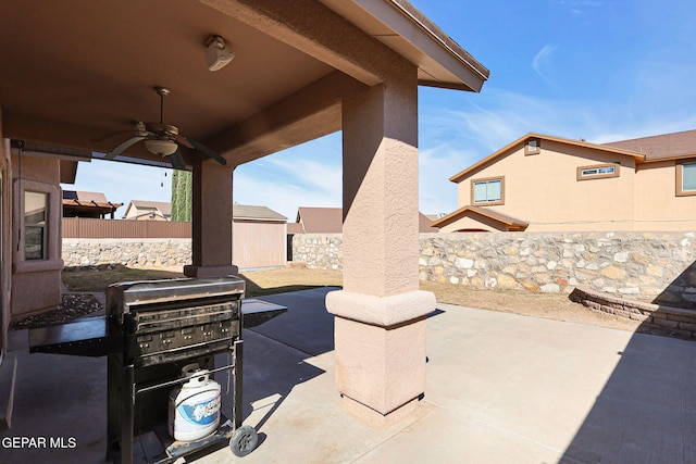 view of patio featuring ceiling fan