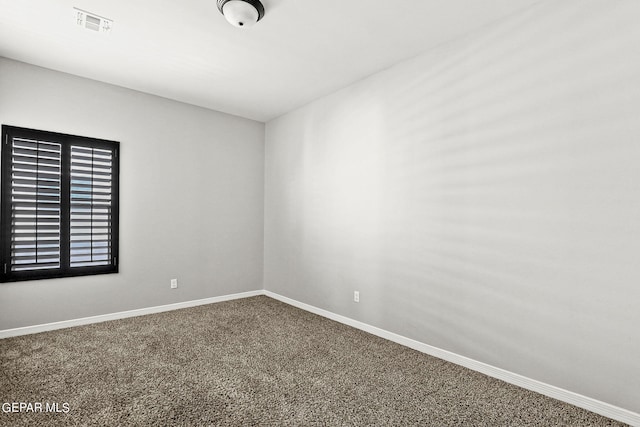 spare room with carpet floors