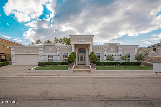 view of front of property with a garage