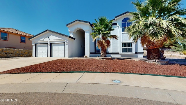 view of front of home with a garage