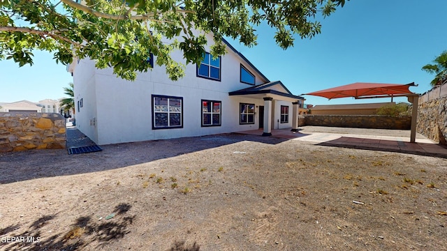 view of front of house with a patio area