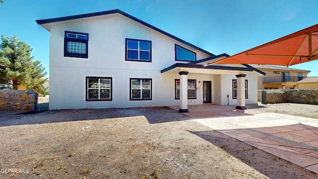 back of house featuring a patio area