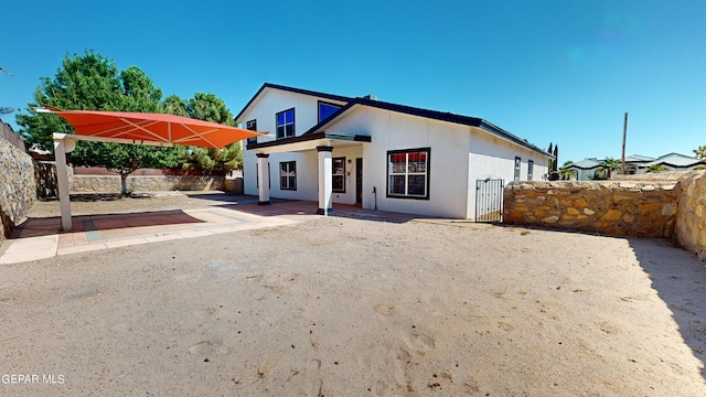 view of front of house featuring a patio