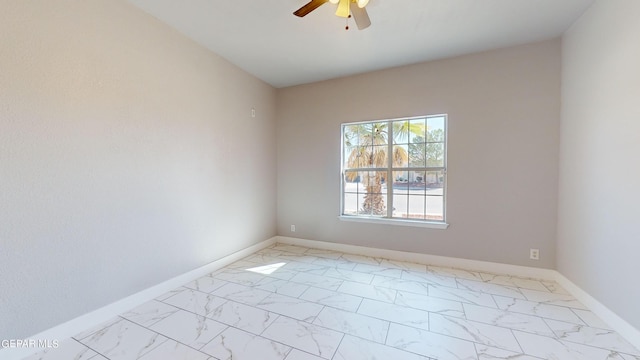 unfurnished room with ceiling fan