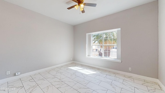 empty room featuring ceiling fan