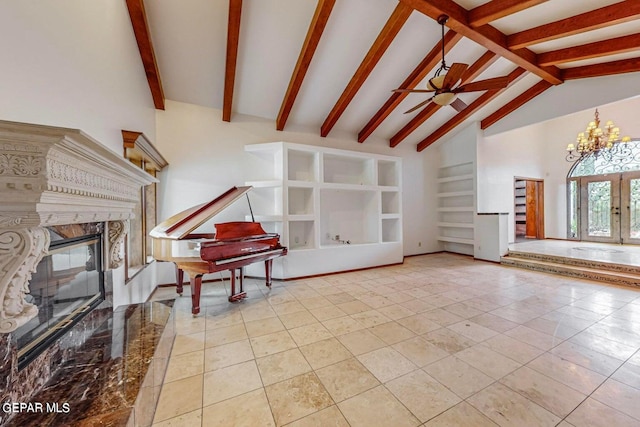 unfurnished living room featuring a high end fireplace, beam ceiling, built in features, and light tile patterned floors