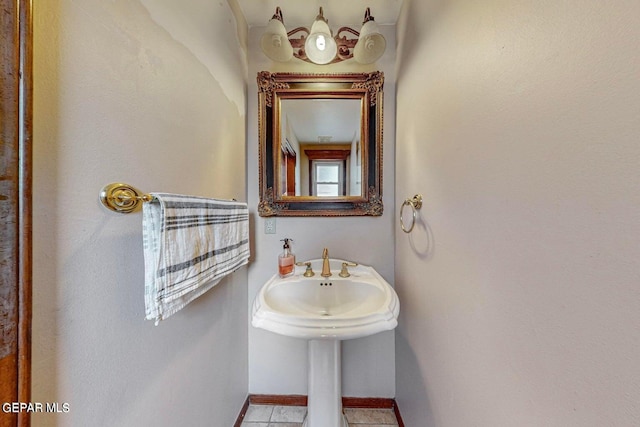 bathroom with tile patterned flooring