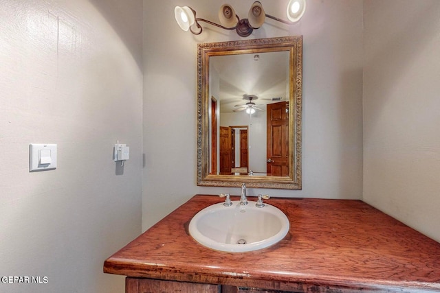 bathroom featuring vanity and ceiling fan