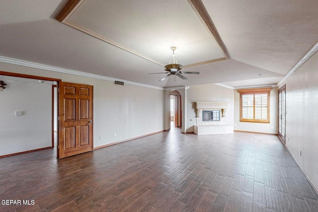 unfurnished living room with crown molding, dark hardwood / wood-style floors, and ceiling fan