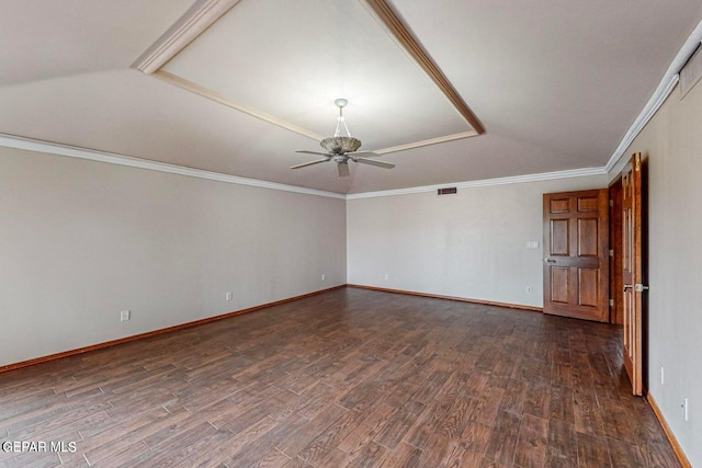 spare room featuring dark wood-type flooring, crown molding, and ceiling fan