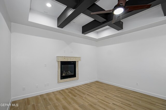 unfurnished room with ceiling fan and light wood-type flooring