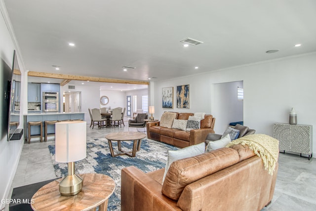 living room with crown molding