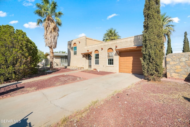 5797 Port Lavaca Dr, El Paso, TX 79924 - view of front of home featuring driveway and brick siding