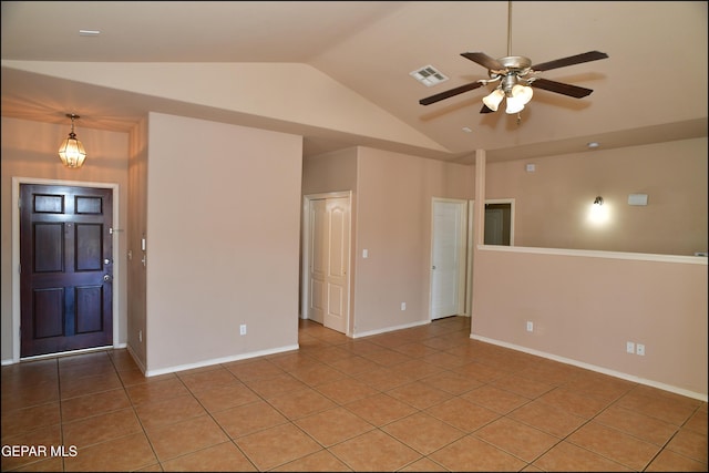 unfurnished room with tile patterned floors, ceiling fan, and lofted ceiling