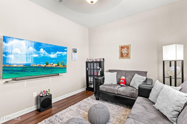 living room featuring dark wood-type flooring