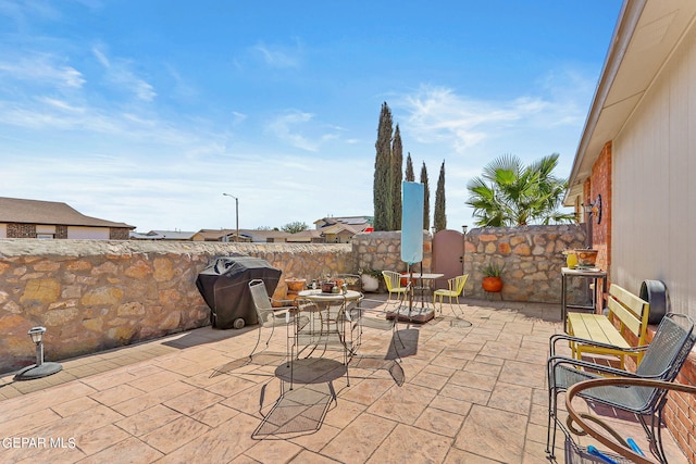 view of patio / terrace featuring a grill