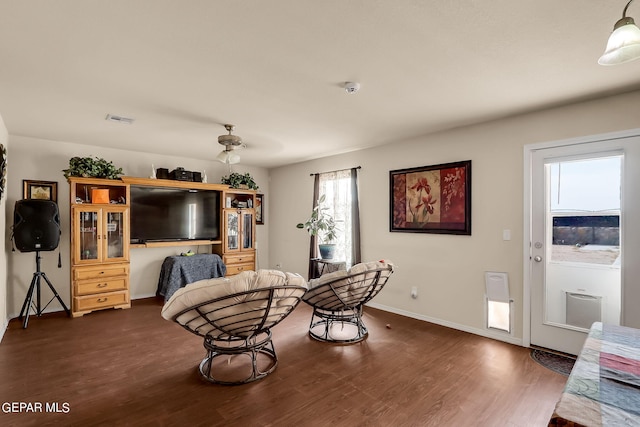 living area featuring dark wood-type flooring