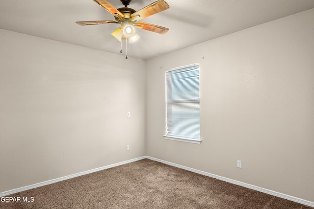 unfurnished room featuring carpet and ceiling fan