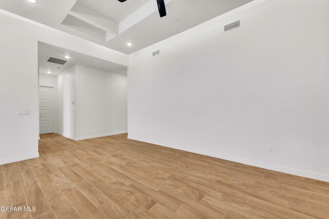 unfurnished room featuring light hardwood / wood-style floors and ceiling fan