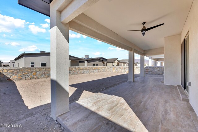 view of patio / terrace featuring ceiling fan