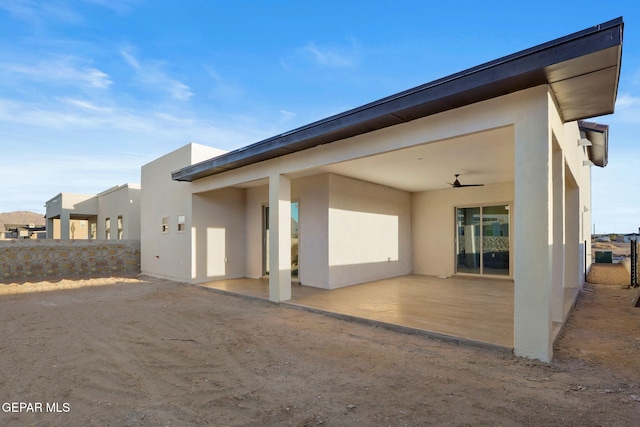 rear view of property featuring a patio area