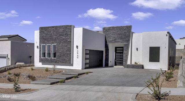 modern home featuring a garage