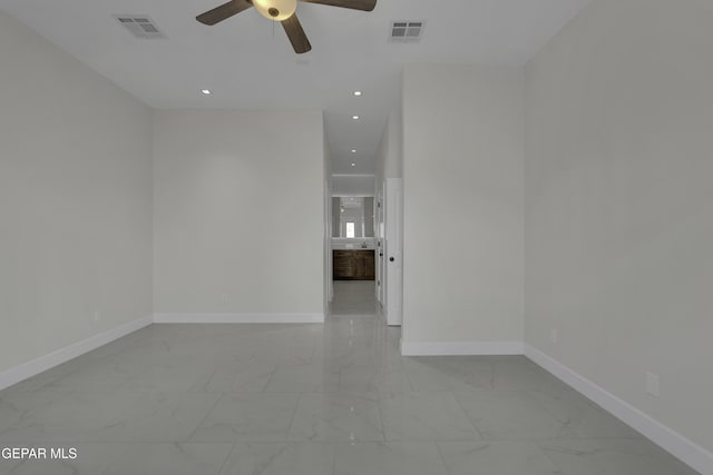 unfurnished room featuring ceiling fan