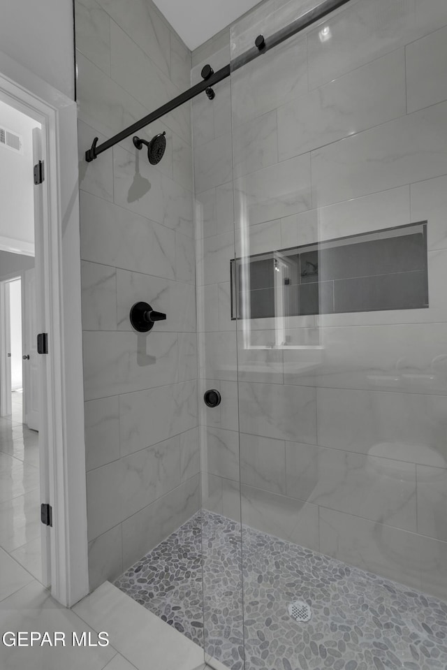 bathroom with an enclosed shower